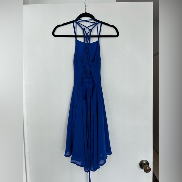 Royal blue flowy dress with fun cut out back. - Picture 2 of 4